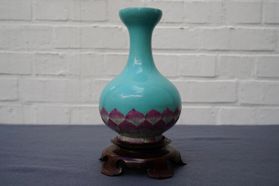 A Chinese famille rose turquoise ground lotus flower-shaped vase, 19/20th C.